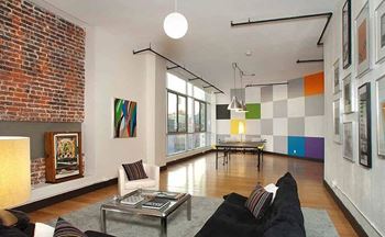 Exposed brick walls and steel columns*